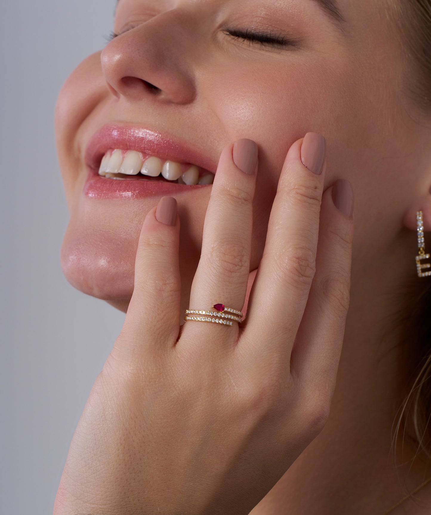 model wearing Ruby Pavé Coil Ring