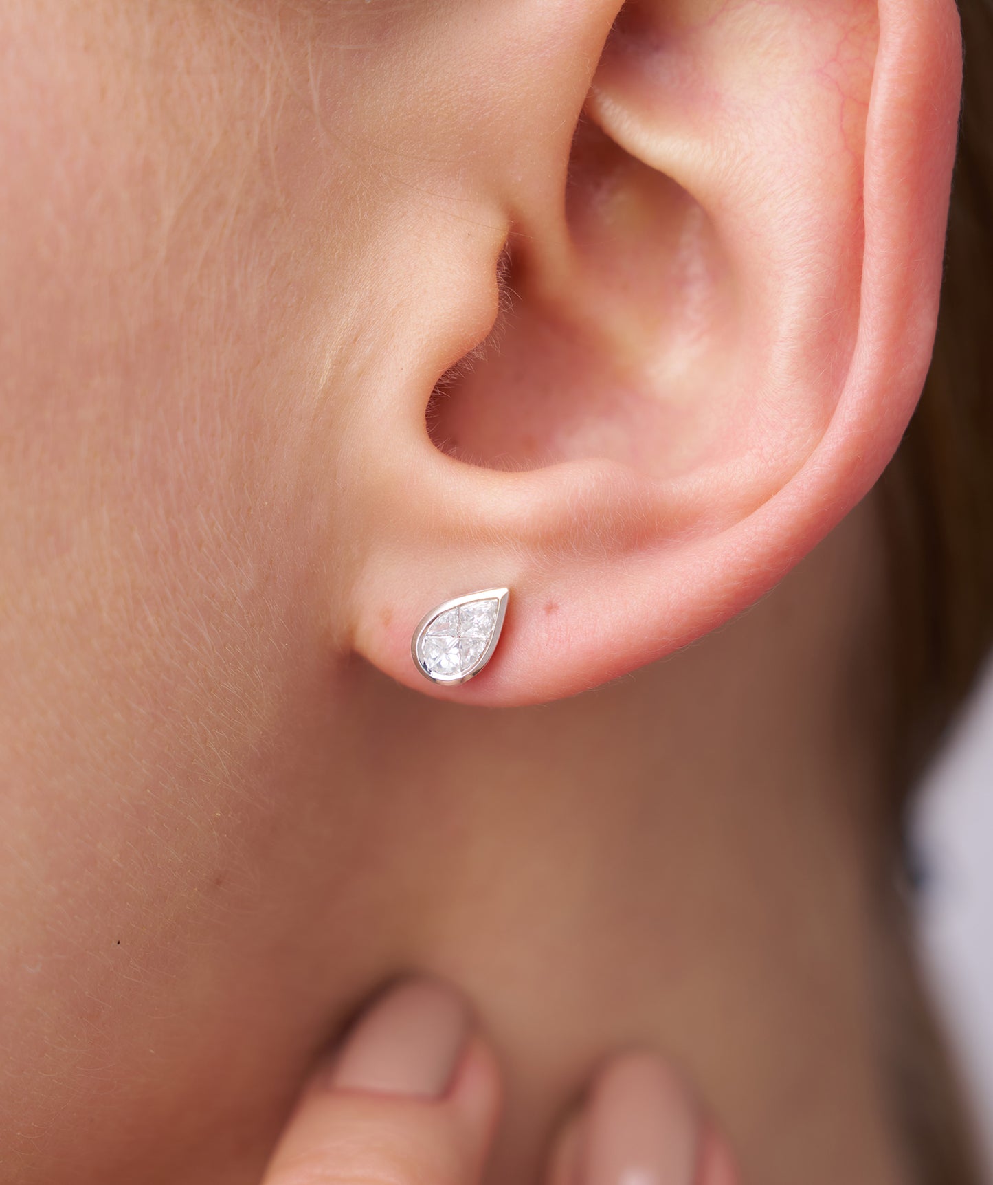 Sleek Bezel-Set Pear Diamond Studs