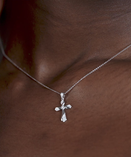 Twisting Light Diamond Cross Necklace