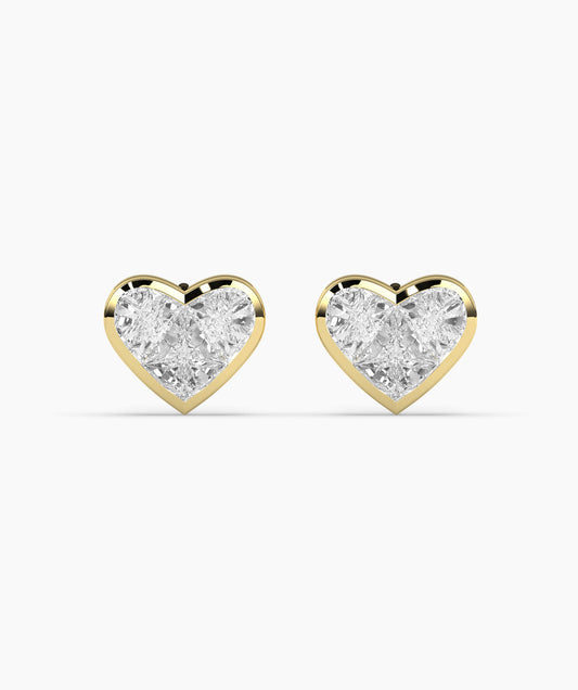 A pair of gold heart-shaped earrings encrusted with diamond-like stones, presented against a white background.