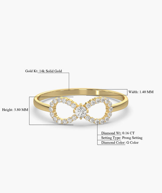 Gold ring with diamond infinity design on a white background