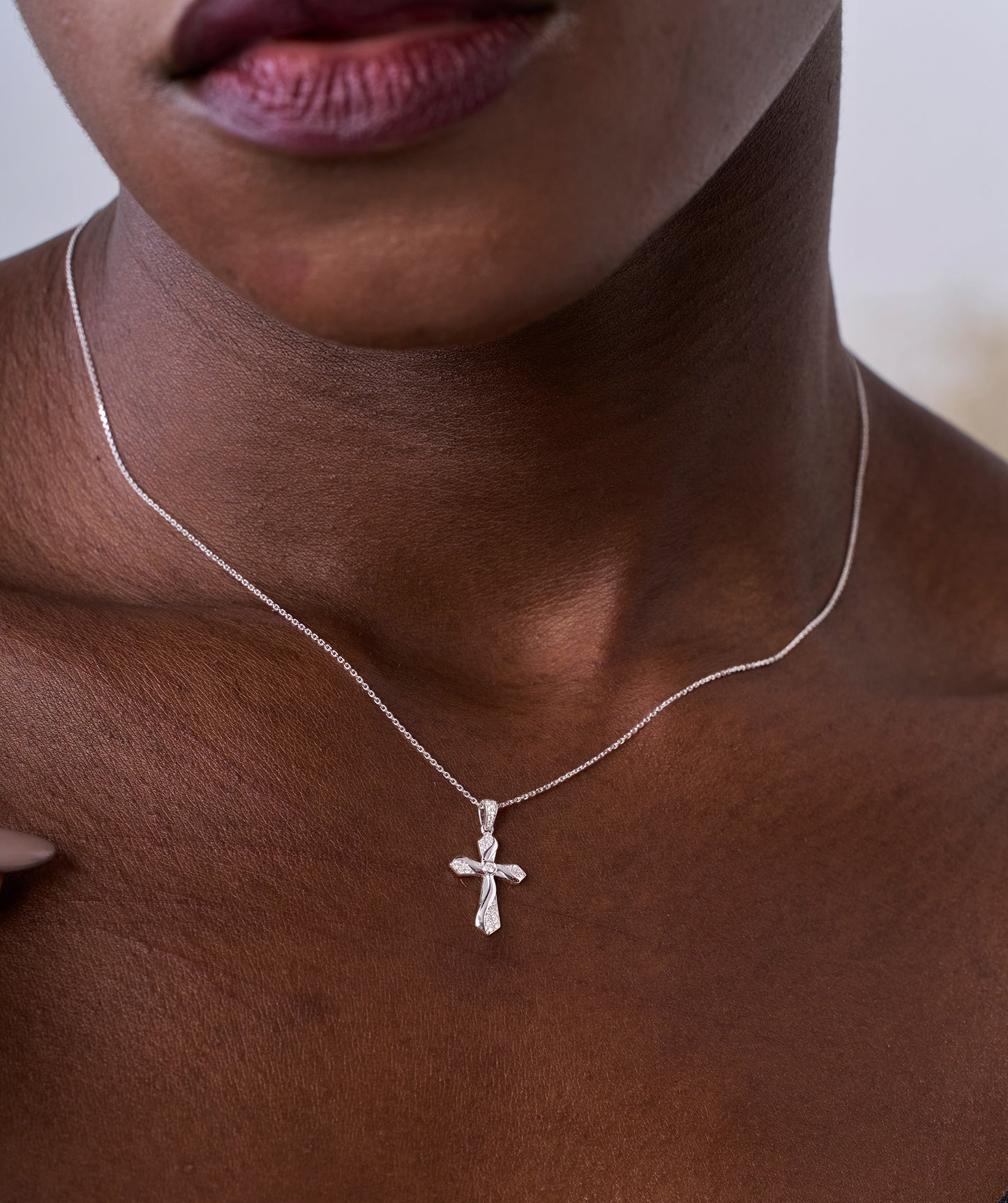 Twisting Light Diamond Cross Necklace