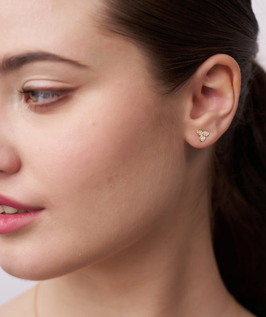 Model Wearing Pavé Trefoil Diamond Stud Earrings 