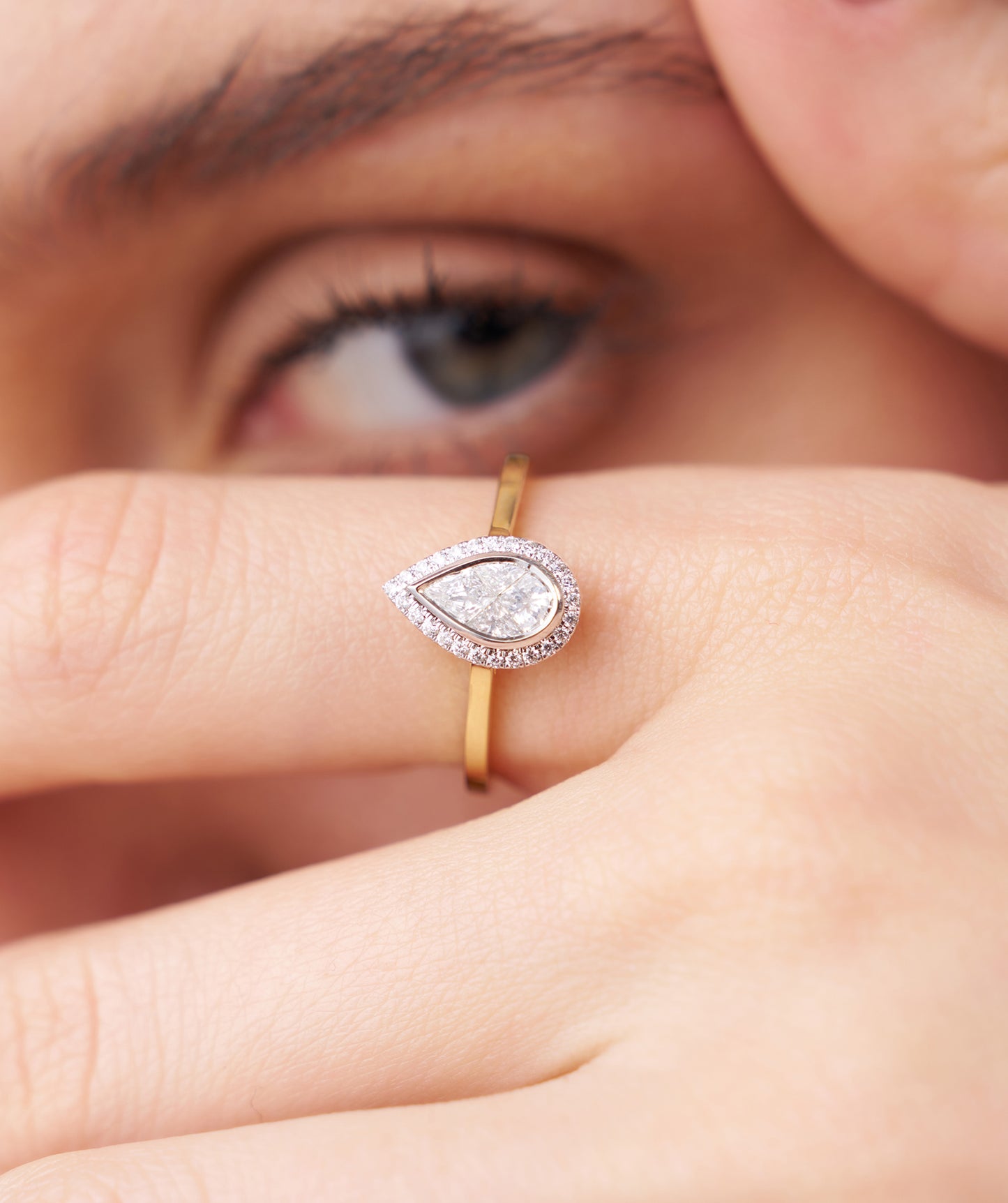 Modern Classic: Pear-Cut Diamond Halo Ring