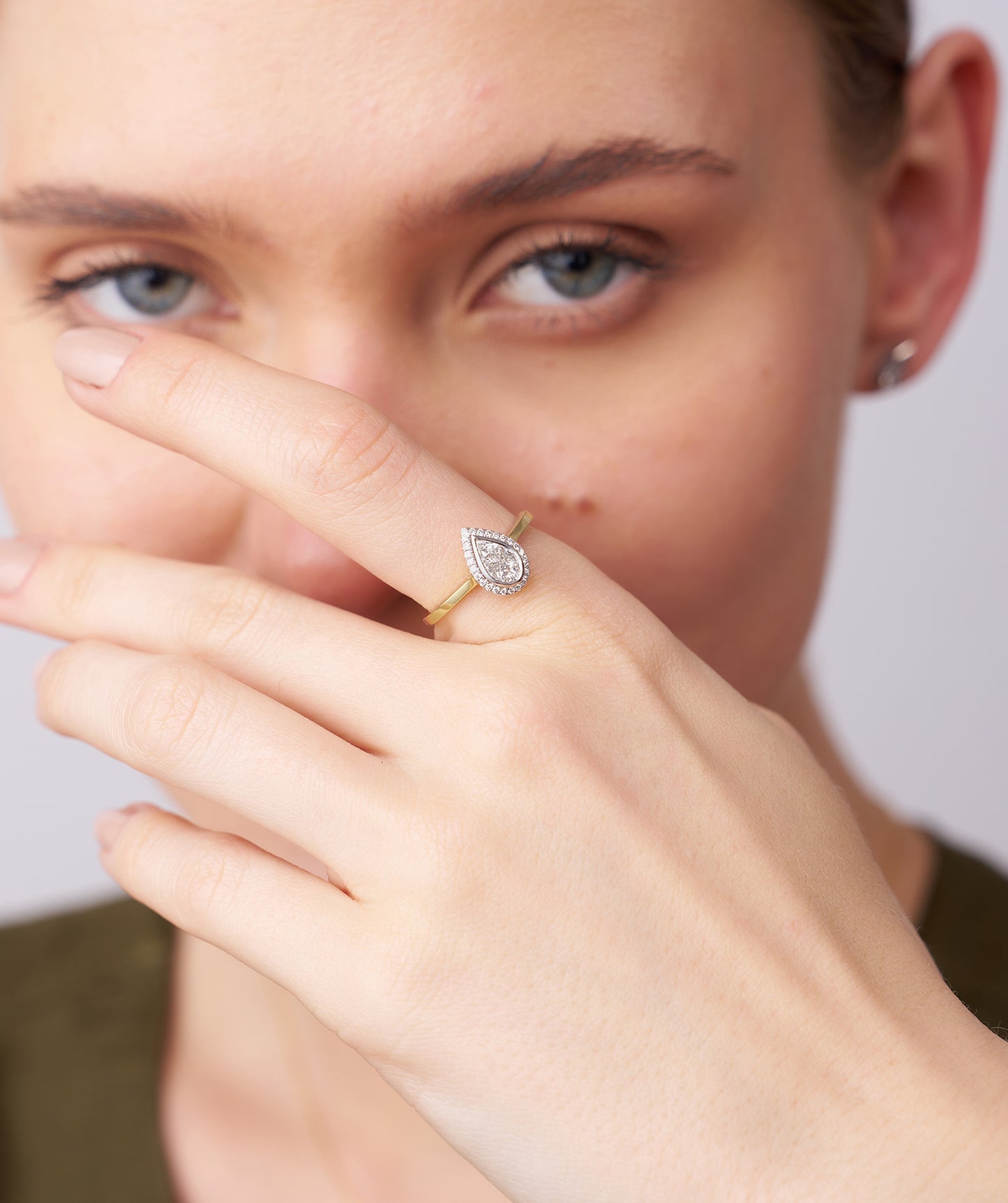Modern Classic: Pear-Cut Diamond Halo Ring