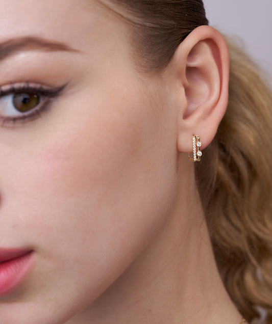 Model Wearing Geometric Double Diamond Bar Huggie Earrings
